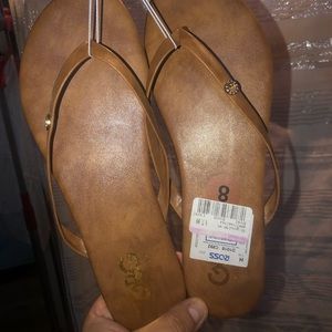 Tan flip flops size 8